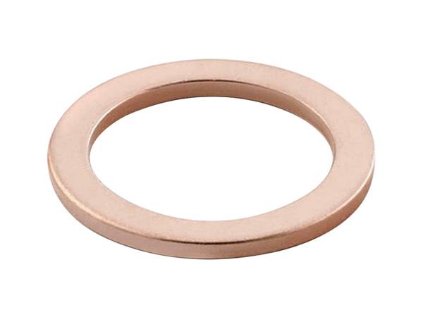 There is a copper gasket on the white background.
